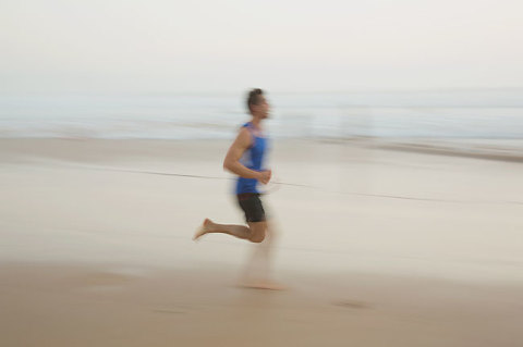 runner along manly beach - impressionist photography